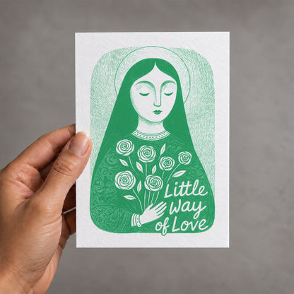 Green St. Thérèse of Lisieux card held in a hand, Little Way of Love illustration