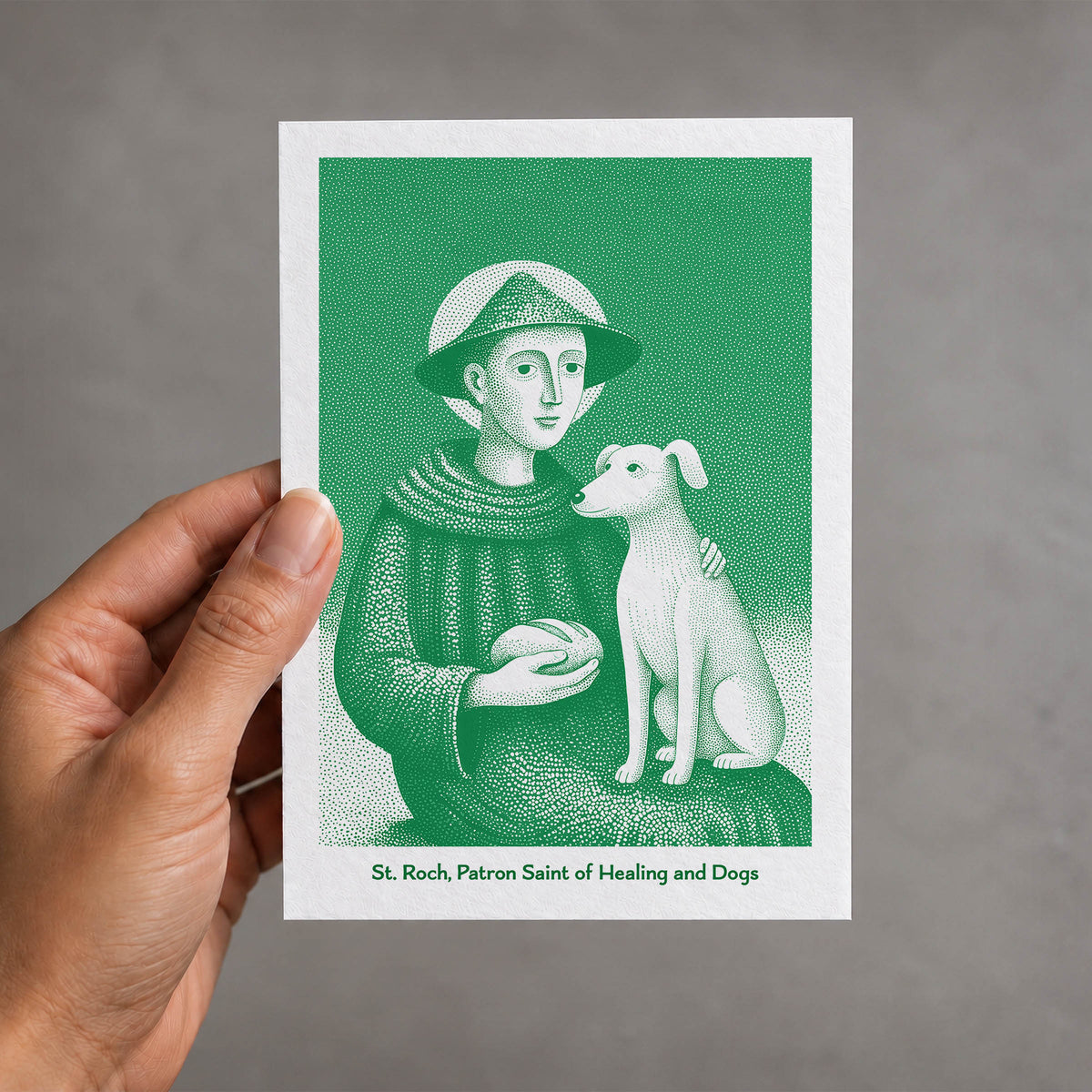 Green St Roch card held in a hand