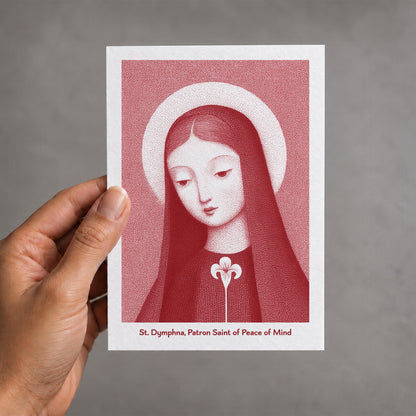 Red St Dymphna card held in a hand