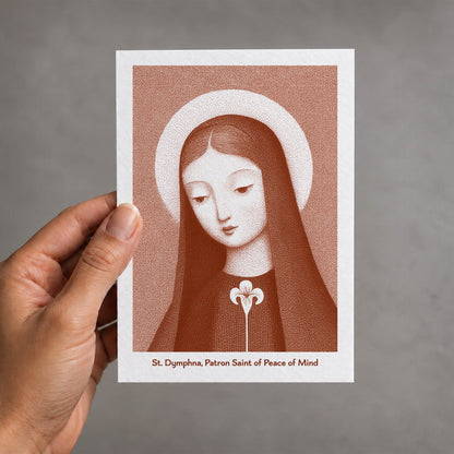 Terracotta St Dymphna card held in a hand