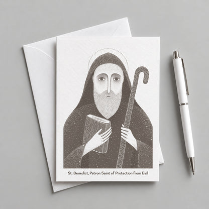 Brown St Benedict card with an envelope and pen
