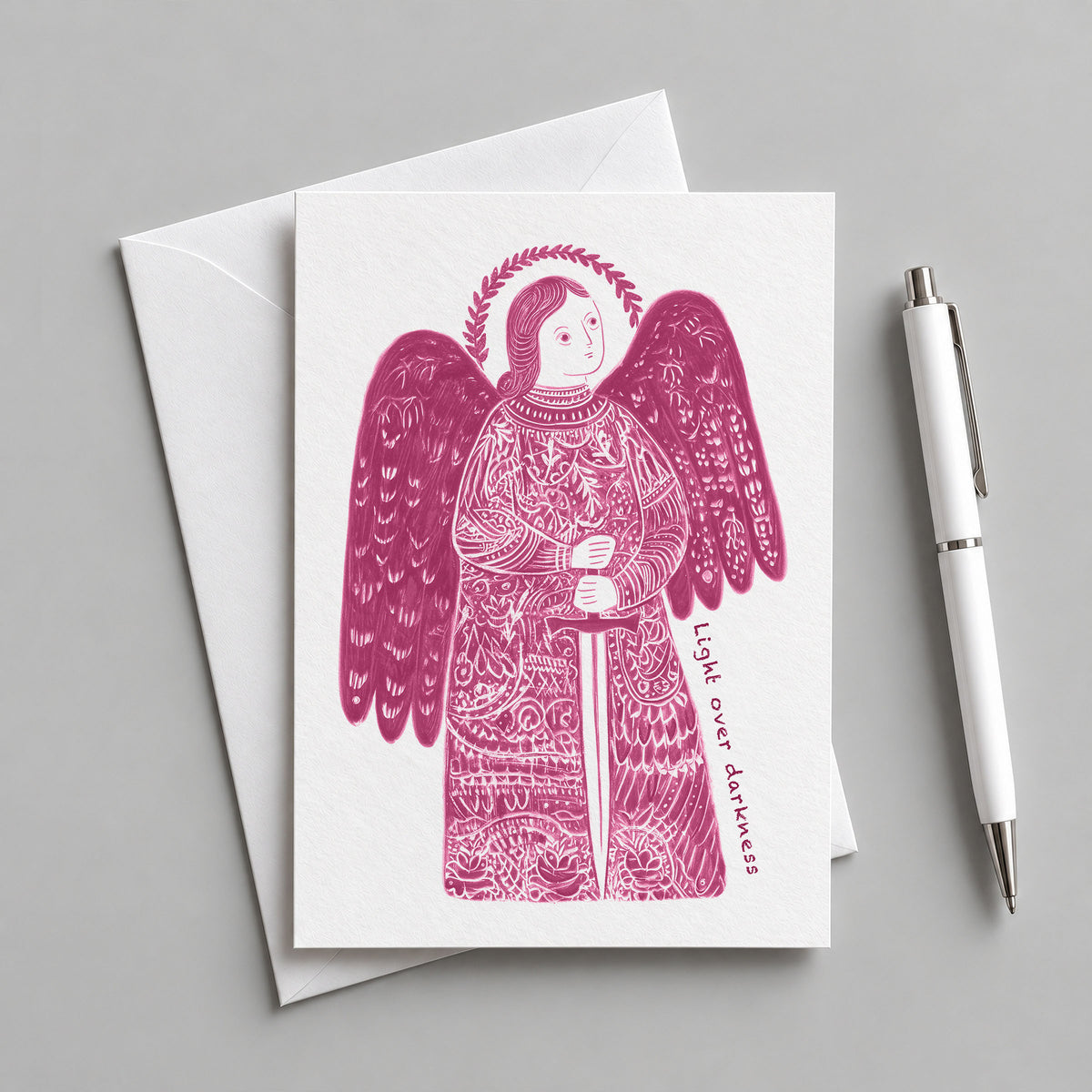 Pink St Michael the Archangel card with an envelope and pen