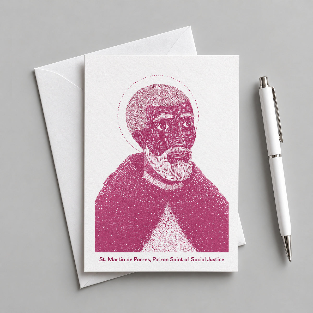 Pink St Martin de Porres card with an envelope and pen