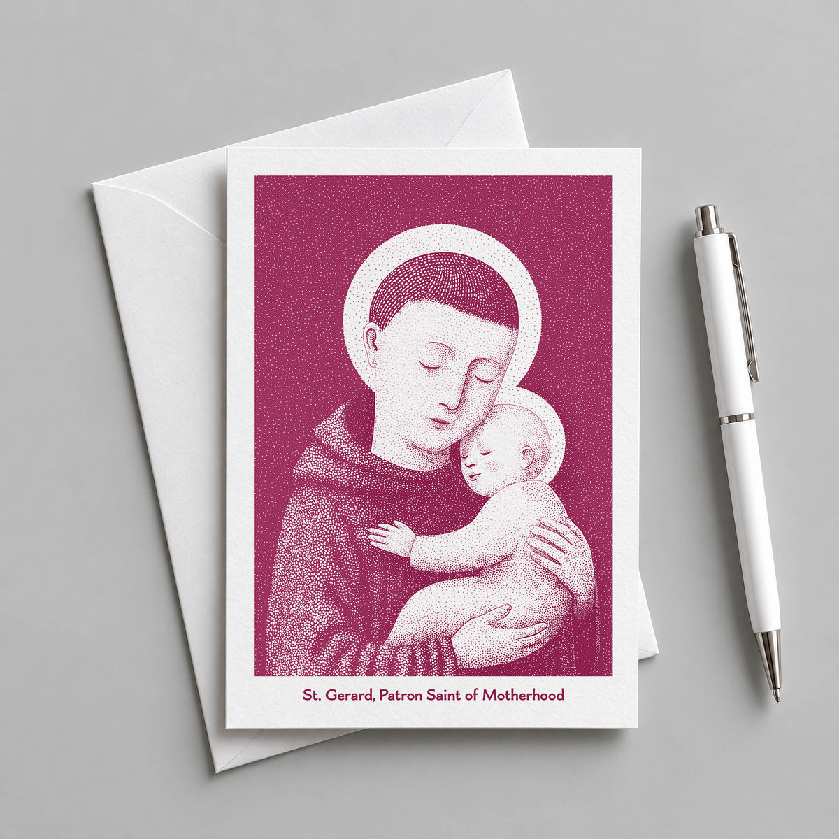 Pink St Gerard Majella card with an envelope and pen