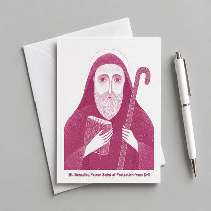 Pink St Benedict card with an envelope and pen