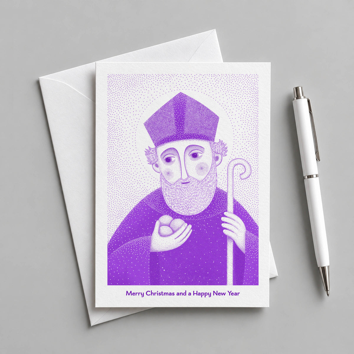 Purple St Nicholas of Myra card with an envelope and pen